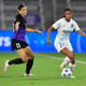 Margaret Purce #23 of the NJ/NY Gotham FC dribbles away from Alex Morgan #13 of the Orlando Pride during a game between NJ/NY Gotham City FC and Orlando Pride at Exploria Stadium on October 9, 2021 in Orlando, Florida.